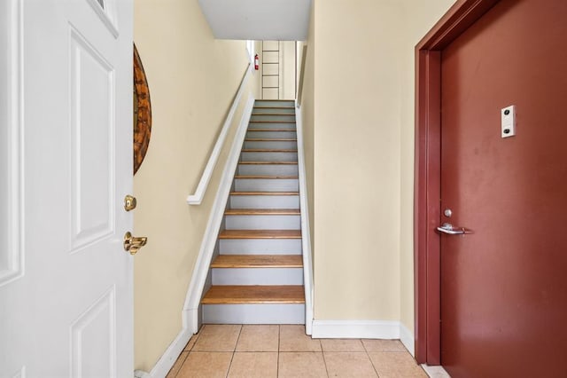 338 Hendrix St, Brooklyn, NY 11207 - stairway featuring baseboards and tile patterned flooring