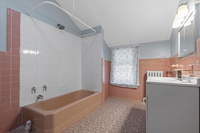 20 The Blvd, New Rochelle, NY 10801 - bathroom with tile walls, vanity, and washtub / shower combination