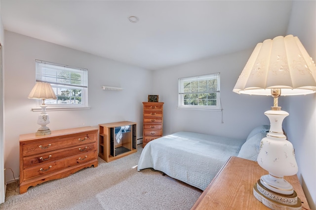 15 Eastover Dr, East Northport, NY 11731 - carpeted bedroom featuring a baseboard heating unit
