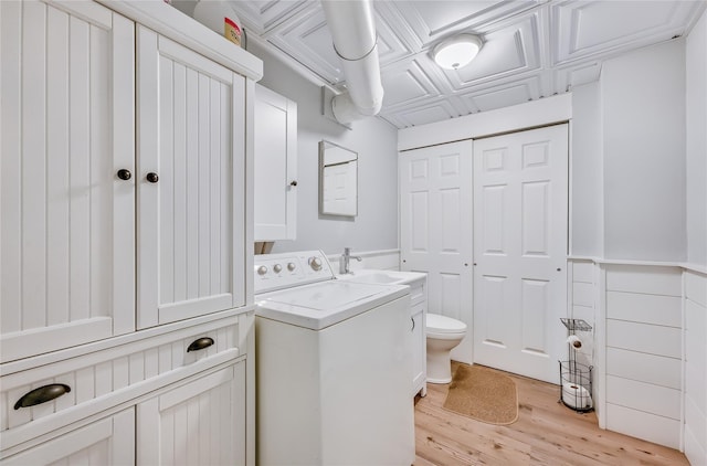 15 Eastover Dr, East Northport, NY 11731 - laundry area featuring washer / dryer and light wood finished floors
