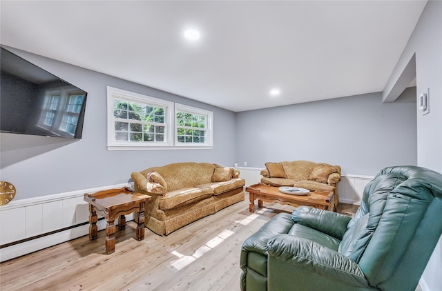 15 Eastover Dr, East Northport, NY 11731 - living area featuring wood finished floors, wainscoting, and recessed lighting