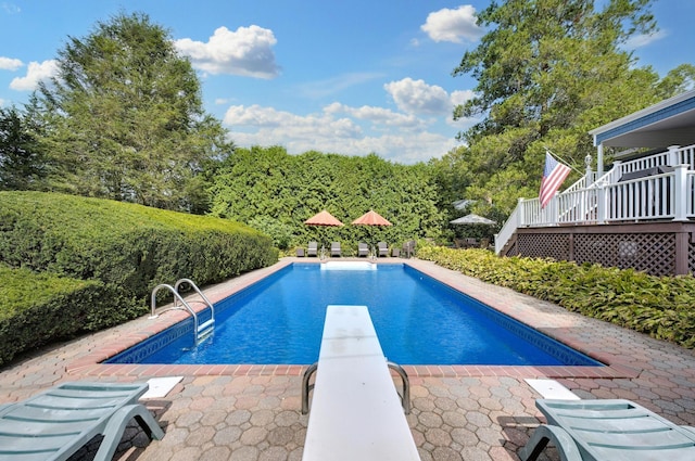 15 Eastover Dr, East Northport, NY 11731 - swimming pool featuring a deck and a diving board