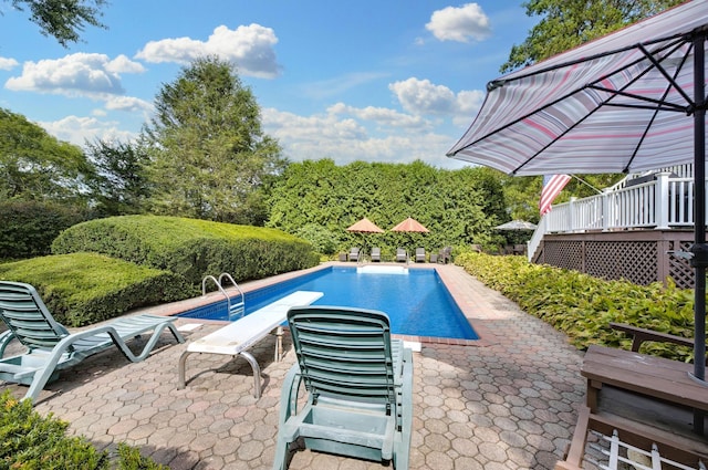 15 Eastover Dr, East Northport, NY 11731 - outdoor pool with a wooden deck and a patio