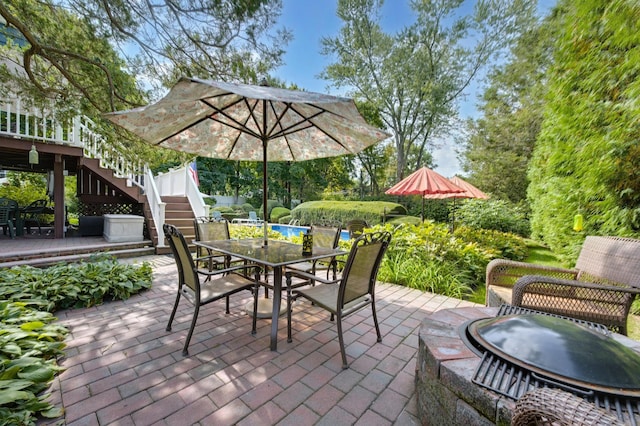 15 Eastover Dr, East Northport, NY 11731 - view of patio with outdoor dining space and stairs