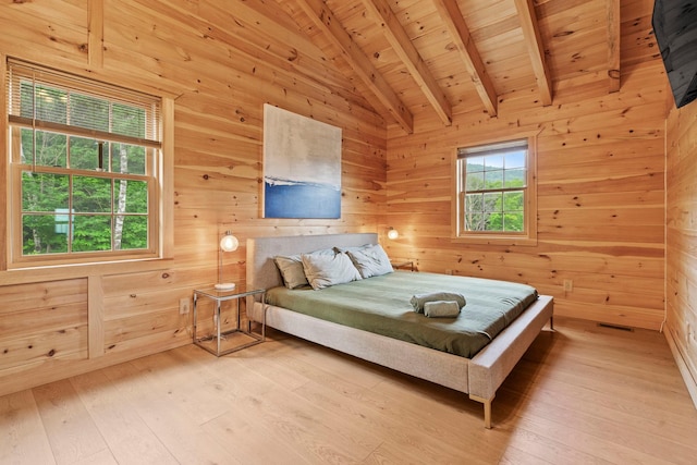 892 Durham Rd, Gilboa, NY 12076 - bedroom with wood ceiling, wooden walls, and light wood-style flooring