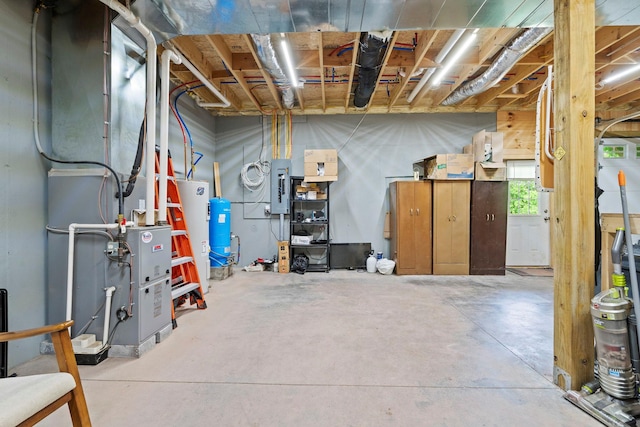 892 Durham Rd, Gilboa, NY 12076 - below grade area with a water pressure tank, electric panel, and water heater