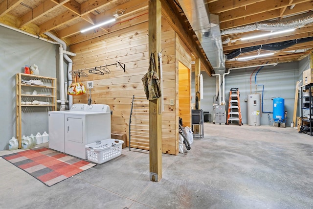 892 Durham Rd, Gilboa, NY 12076 - unfinished below grade area with separate washer and dryer, water heater, a water pressure tank, and wood walls