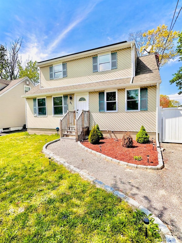 21 Pennwood Dr, Mastic Beach, NY 11951 - traditional home with a front yard