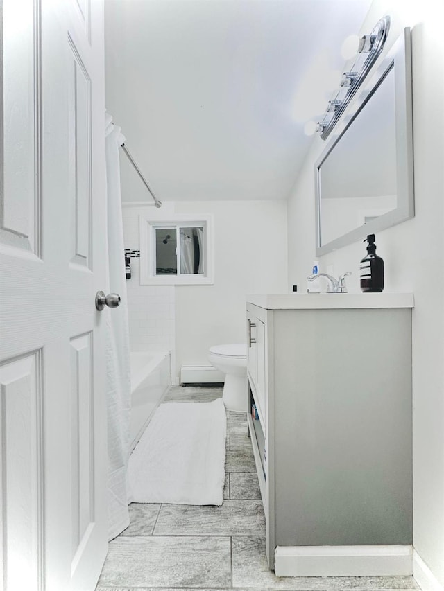 21 Pennwood Dr, Mastic Beach, NY 11951 - full bathroom with vanity, shower / bath combination with curtain, and baseboard heating