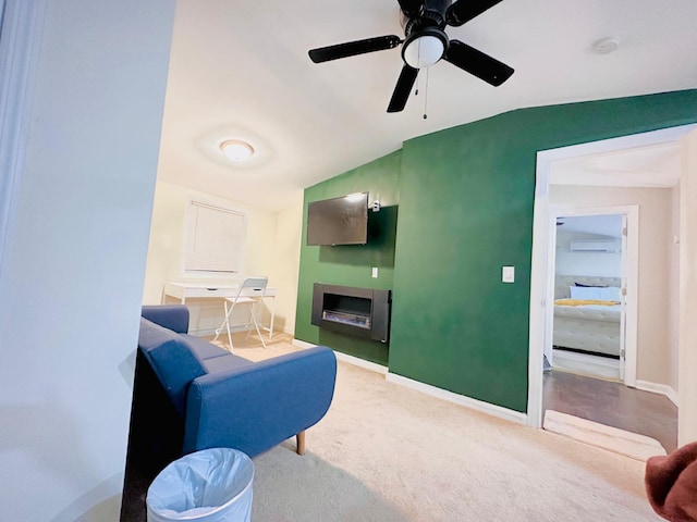 21 Pennwood Dr, Mastic Beach, NY 11951 - sitting room with a fireplace, carpet floors, vaulted ceiling, and a ceiling fan