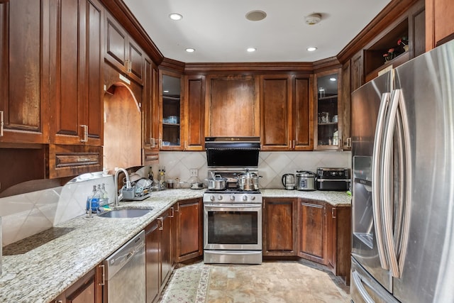 38-16 220th St, Bayside, NY 11361 - kitchen featuring appliances with stainless steel finishes, backsplash, light stone counters, glass insert cabinets, and recessed lighting
