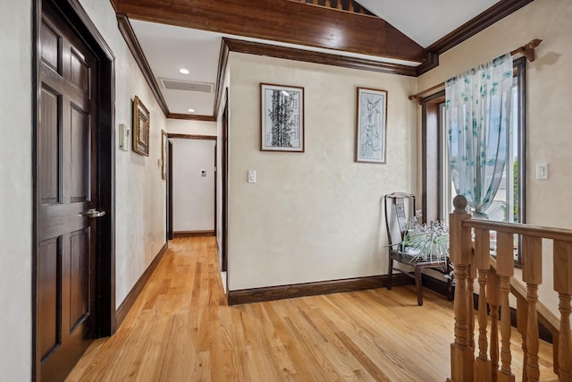 38-16 220th St, Bayside, NY 11361 - corridor with crown molding, light wood finished floors, and vaulted ceiling