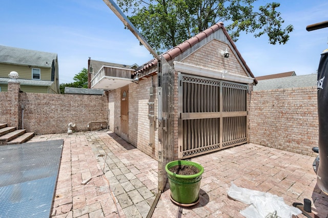38-16 220th St, Bayside, NY 11361 - fenced backyard with a patio