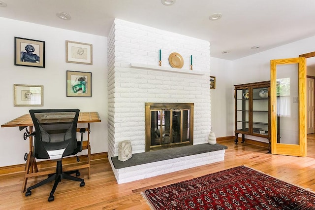 4 Mary Ann Ave, Saugerties, NY 12477 - living room featuring wood finished floors, a brick fireplace, and recessed lighting