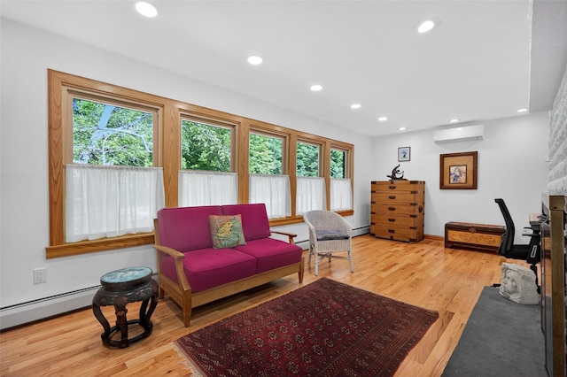 4 Mary Ann Ave, Saugerties, NY 12477 - living room with a wall mounted air conditioner, recessed lighting, wood finished floors, and a baseboard radiator