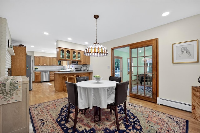 4 Mary Ann Ave, Saugerties, NY 12477 - dining space featuring a baseboard heating unit, light wood-style flooring, and recessed lighting