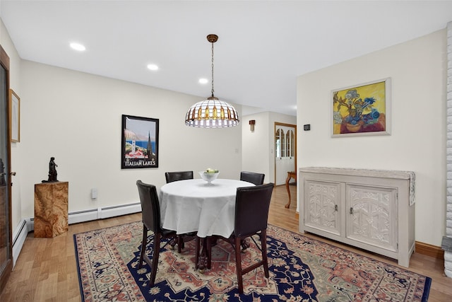 4 Mary Ann Ave, Saugerties, NY 12477 - dining room with a baseboard heating unit, light wood-style floors, and recessed lighting