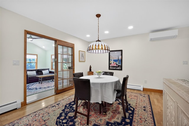 4 Mary Ann Ave, Saugerties, NY 12477 - dining area featuring a wall unit AC, baseboard heating, light wood-style flooring, and recessed lighting