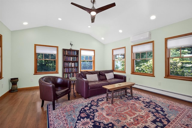 4 Mary Ann Ave, Saugerties, NY 12477 - living room with a wall mounted air conditioner, wood finished floors, healthy amount of natural light, vaulted ceiling, and recessed lighting