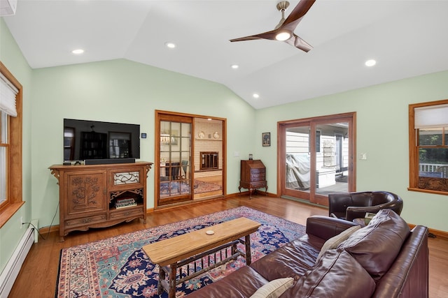 4 Mary Ann Ave, Saugerties, NY 12477 - living area with baseboard heating, lofted ceiling, wood finished floors, ceiling fan, and recessed lighting