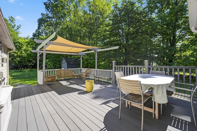 4 Mary Ann Ave, Saugerties, NY 12477 - deck featuring a storage unit and outdoor dining area