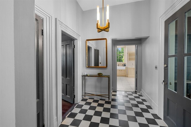 103 Albany Ave, Kingston, NY 12401 - entrance foyer with a chandelier and dark flooring