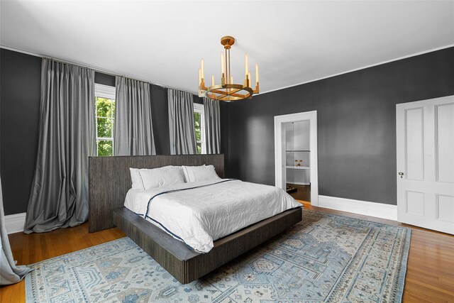 103 Albany Ave, Kingston, NY 12401 - bedroom featuring a chandelier and wood finished floors