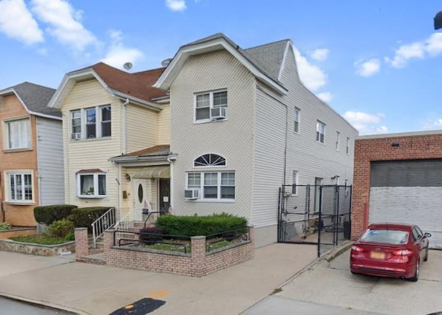 6955 78th St, Middle Village, NY 11379 - view of front of home with a gate