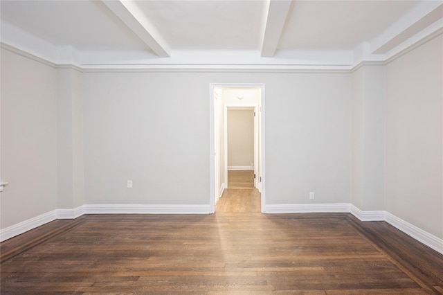 142 E 49th St Unit 4C, New York Manhattan, NY 10017 - empty room with beam ceiling and wood finished floors