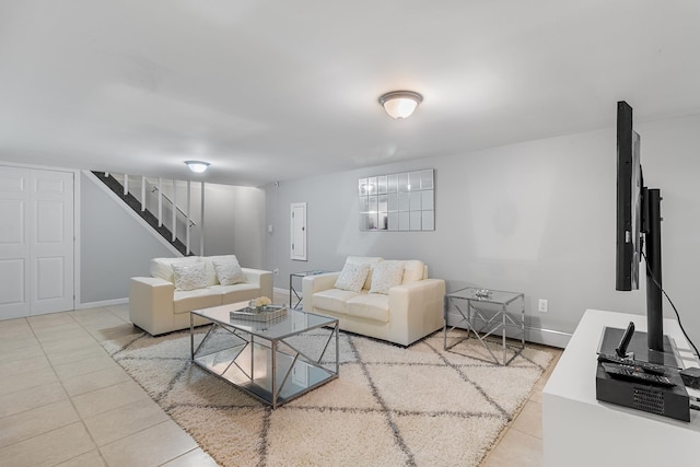 40 Ridge Haven Dr, Ridge, NY 11961 - living room featuring stairs, tile patterned floors, and electric panel