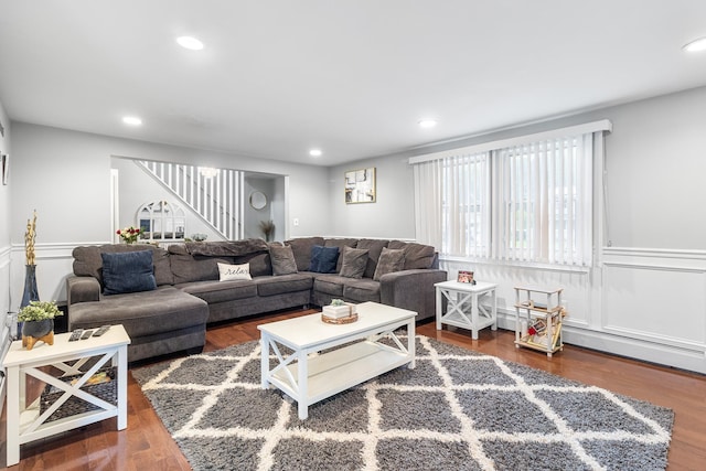 40 Ridge Haven Dr, Ridge, NY 11961 - living area featuring wainscoting, wood finished floors, recessed lighting, stairs, and a decorative wall