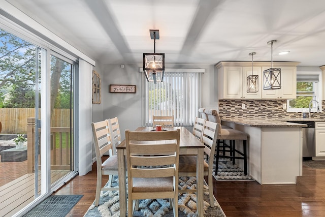 40 Ridge Haven Dr, Ridge, NY 11961 - dining room featuring plenty of natural light, dark wood-style flooring, a chandelier, and recessed lighting