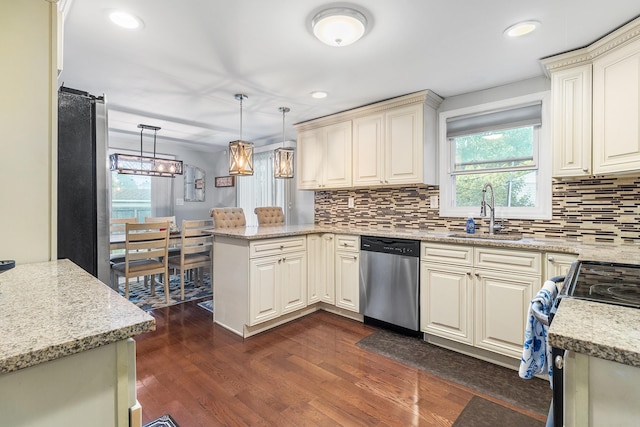 40 Ridge Haven Dr, Ridge, NY 11961 - kitchen featuring stainless steel appliances, a peninsula, plenty of natural light, dark wood-type flooring, and recessed lighting