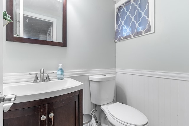40 Ridge Haven Dr, Ridge, NY 11961 - half bathroom featuring a wainscoted wall and vanity