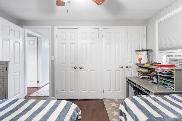 40 Ridge Haven Dr, Ridge, NY 11961 - bedroom featuring wood finished floors, two closets, and a ceiling fan