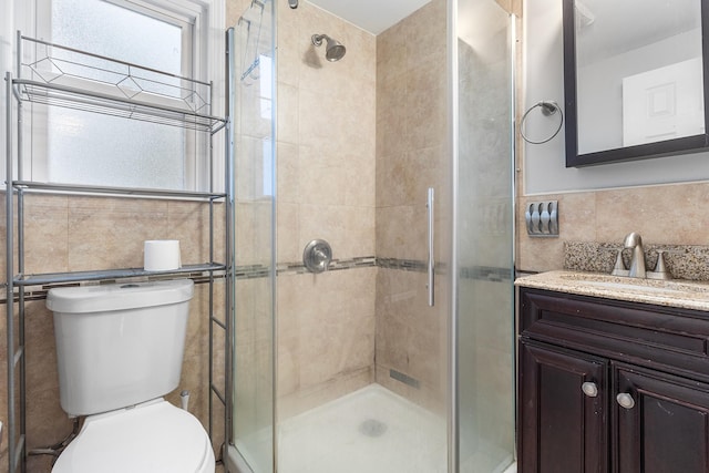 40 Ridge Haven Dr, Ridge, NY 11961 - bathroom with tile walls, a stall shower, vanity, and plenty of natural light