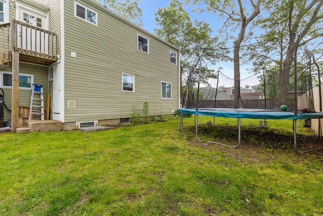 40 Ridge Haven Dr, Ridge, NY 11961 - view of yard with a trampoline and a balcony