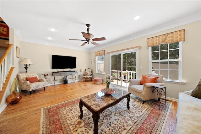 102 Paget Ln, Massapequa, NY 11758 - living room featuring ceiling fan, crown molding, stairway, wood finished floors, and recessed lighting