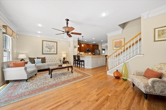 102 Paget Ln, Massapequa, NY 11758 - living area with a ceiling fan, light wood-style flooring, crown molding, stairs, and recessed lighting