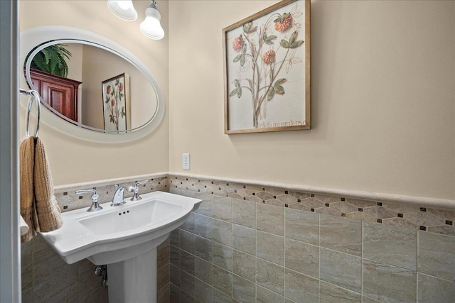 102 Paget Ln, Massapequa, NY 11758 - bathroom featuring wainscoting and tile walls