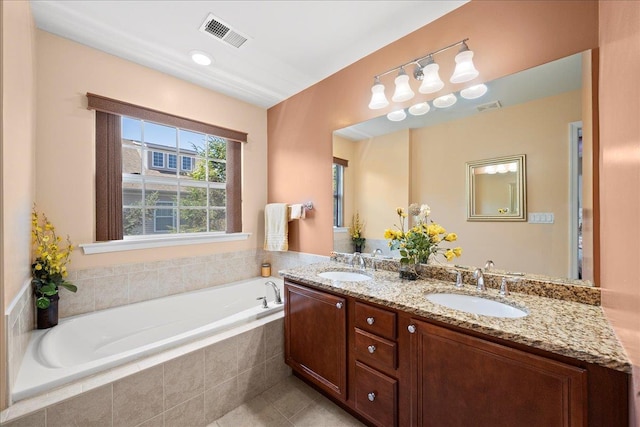 102 Paget Ln, Massapequa, NY 11758 - full bath featuring double vanity, a bath, and tile patterned floors