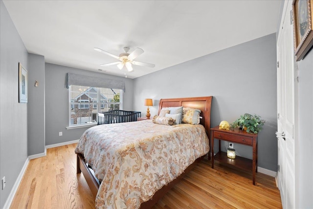 102 Paget Ln, Massapequa, NY 11758 - bedroom featuring light wood-type flooring and ceiling fan