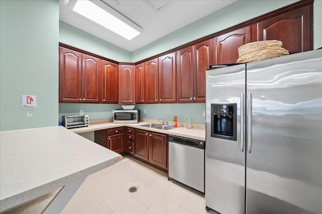 102 Paget Ln, Massapequa, NY 11758 - kitchen with stainless steel appliances and light countertops