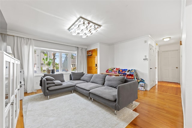 2354 128th St, College Point, NY 11356 - living room featuring light wood-style floors and crown molding