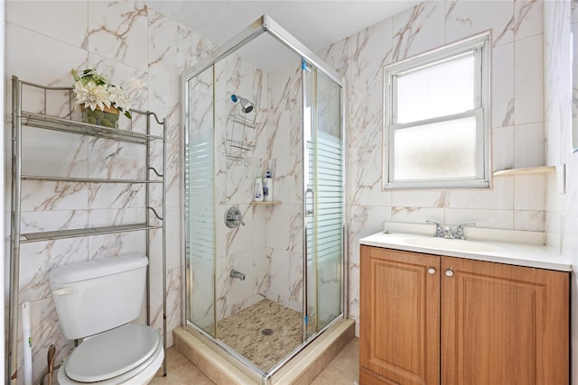 2354 128th St, College Point, NY 11356 - full bath with tile walls, vanity, a shower stall, and tile patterned flooring