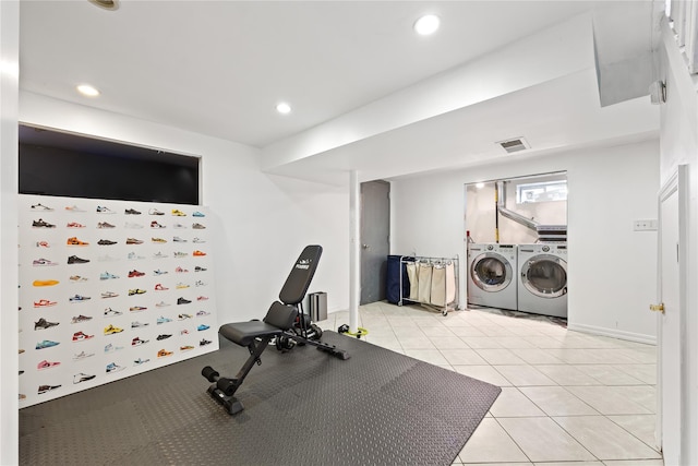 2354 128th St, College Point, NY 11356 - workout room with washing machine and clothes dryer, recessed lighting, and light tile patterned floors