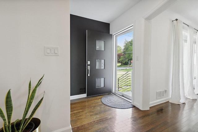 187 Thornbury Rd, Scarsdale, NY 10583 - foyer entrance with wood-type flooring and baseboards