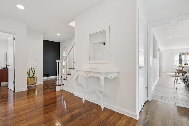 187 Thornbury Rd, Scarsdale, NY 10583 - hallway with wood finished floors, stairway, and recessed lighting