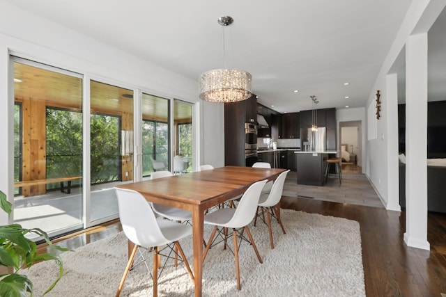 187 Thornbury Rd, Scarsdale, NY 10583 - dining space with a chandelier, wood finished floors, and recessed lighting