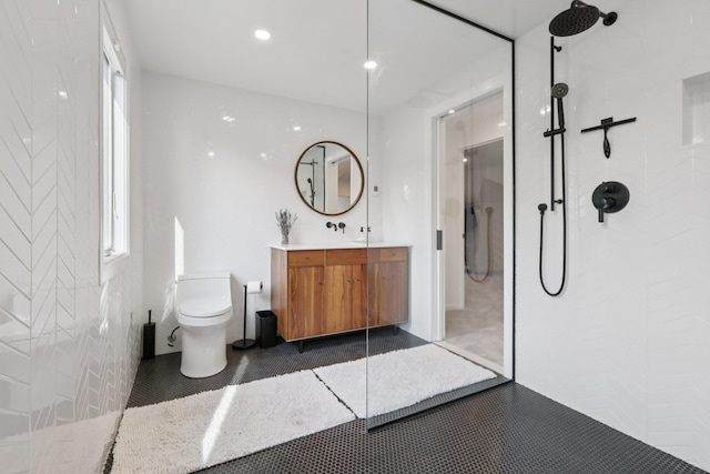 187 Thornbury Rd, Scarsdale, NY 10583 - bathroom with vanity, a walk in shower, recessed lighting, and healthy amount of natural light